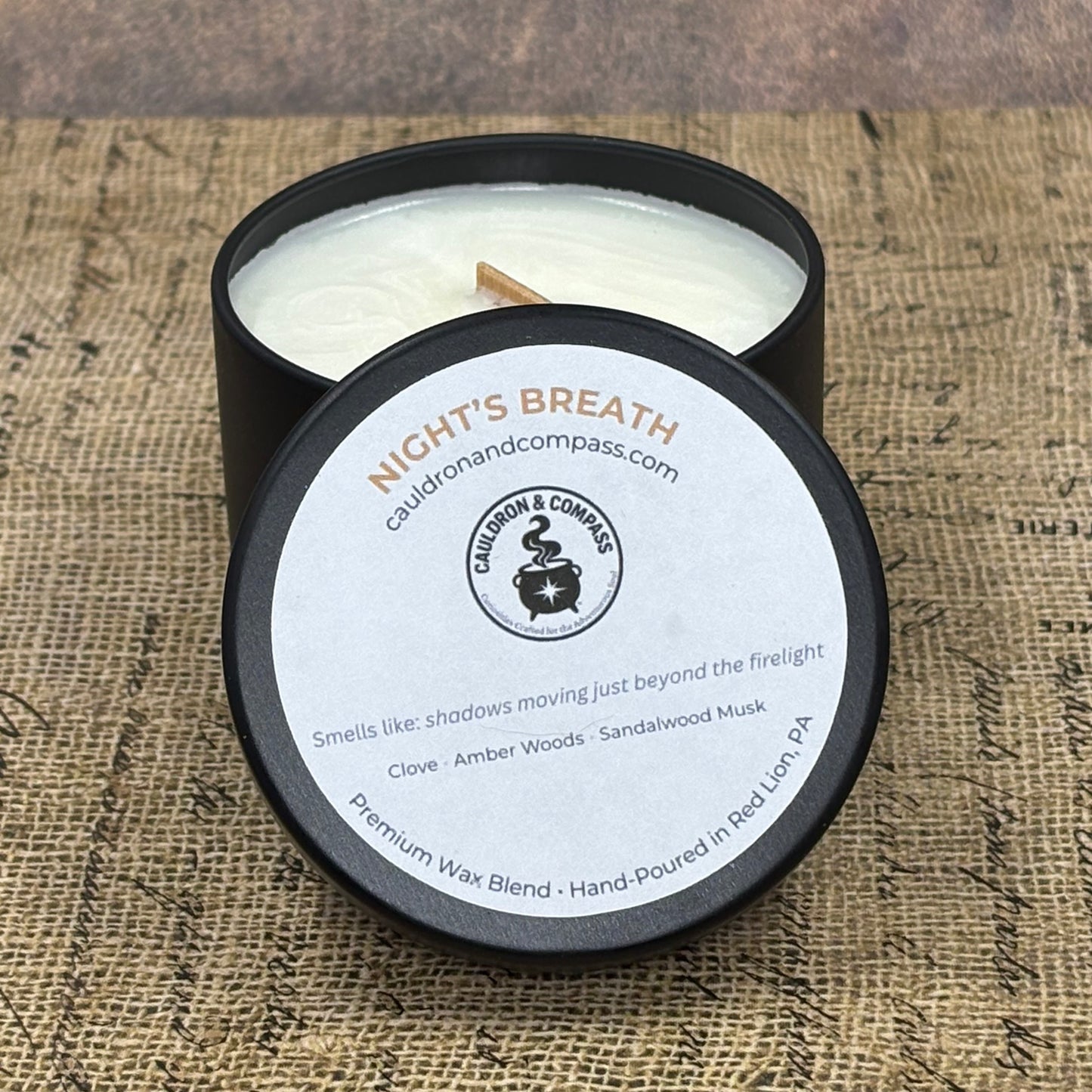 Night’s Breath – 4 oz Candle | Clove, Amber Woods & Sandalwood Musk |  Black Tin | Wood Wick