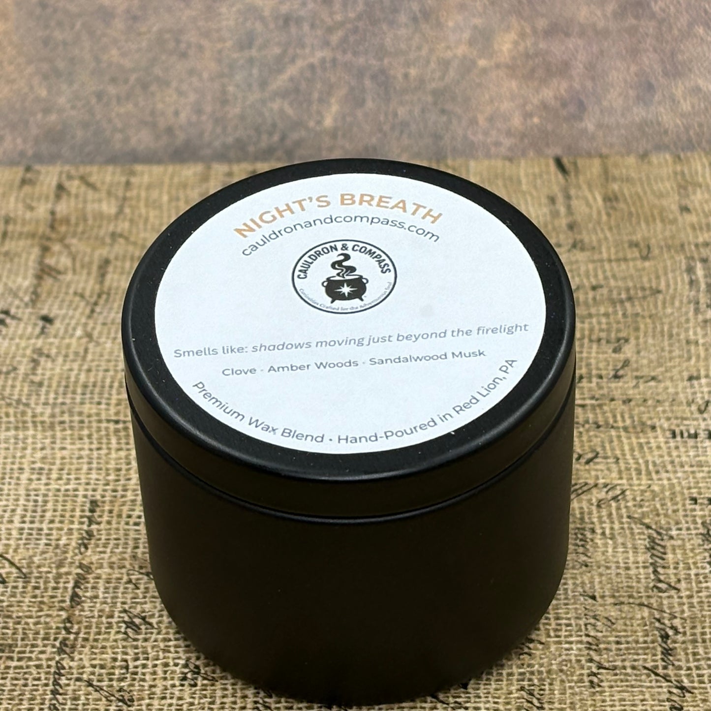 Night’s Breath – 4 oz Candle | Clove, Amber Woods & Sandalwood Musk |  Black Tin | Wood Wick